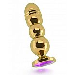 <strong>Золотистая фигурная анальная пробка R10 RICH Gold/Purple с фиолетовым кристаллом - 14,5 см.</strong> <br />
Эта роскошная анальная пробка гарантирует Вам именно те ощущения от анальных игр, которые Вы хотите испытать! Эта специальная пробка имеет элегантный сглаженный дизайн с 3 стимулирующими шариками различного диаметра. <div class="charTableblock"><div><span>Длина, см</span>: 14,5</div><div><span>Диаметр, см</span>: 3,3</div><div><span>Материал</span>: металл</div><div><span>Цвет</span>: другой</div><div><span>Особенности</span>: пробка; ювелирка</div><div><span>Особенности</span>: без вибрации; ребристая</div><div><span>Длина, см</span>: 13-16</div><div><span>Диаметр, см</span>: 3</div><div><span>Цвет кристалла</span>: голубой/синий/фиолетоый</div></div> Золотистая фигурная анальная пробка R10 RICH Gold/Purple с фиолетовым кристаллом - 14,5 см.
Эта роскошная анальная пробка гарантирует Вам именно те ощущения от анальных игр, которые Вы хотите испытать! Эта специальная пробка имеет элегантный сглаженный дизайн с 3 стимулирующими шариками различного диаметра.