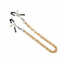 <strong>Зажимы на соски, соединённые золотистой цепочкой</strong> <br />
Классические зажимы для сосков.<div class="charTableblock"><div><span>Производитель</span>: Пикантные штучки, Россия</div></div> Зажимы на соски, соединённые золотистой цепочкой
Классические зажимы для сосков.